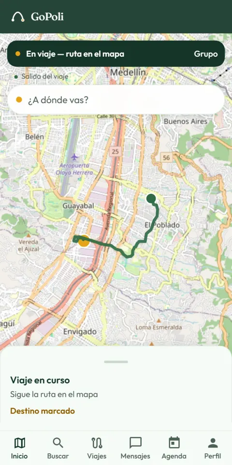 GoPoli on a phone during a trip, with the route drawn over the map of Medellín from the departure point to the destination and the trip in progress panel